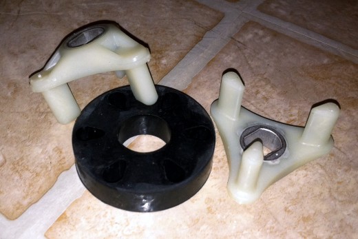 ...And as I inch closer to becoming a washing machine repair expert, I replaced the motor coupler on our washing machine tonight.  Yay for clean clothes