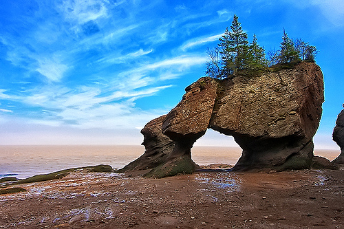 The Bay of Fundy has been carved by the massive tidal surges over the eons to create these interesting structures that serve as modern tourist attractions.