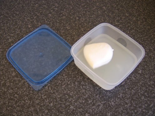 Soft buffalo mozzarella, usually sold in brine, is the type used in this recipe and not the firmer variety of mozzarella which would be used on pizzas