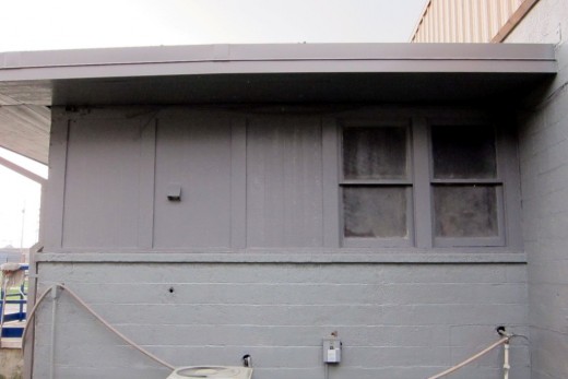 We boarded up one of the back windows last Friday, so today I went ahead and slapped some paint on it so it would match up.