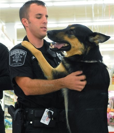Picture credit  Berks County Sheriff's Deputy Kyle Pagerly with his partner, Jynx. (AP Photo/Reading Eagle, Tim Leedy, 2009)