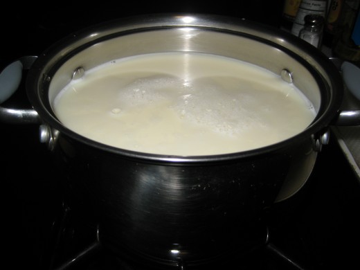 Soil milk in pot - ready to be boiled.