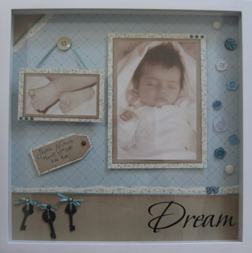 A framed scrapbook page makes beautiful and personal gifts. 