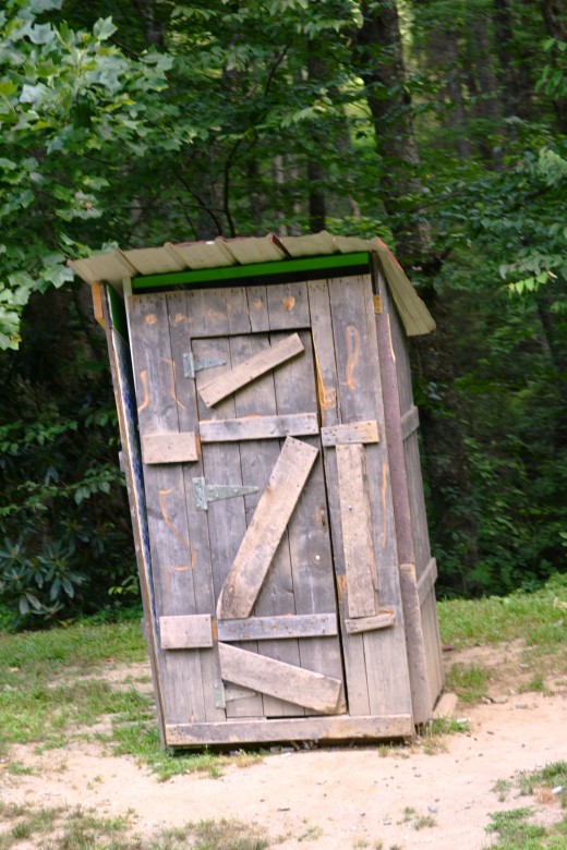 the lil outhouse got blown up with a stick of dynamite