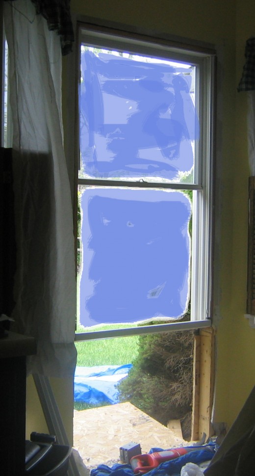 Fig 4.  Window Ready To Be Removed.  The tightness between frame and studs are holding the window up.