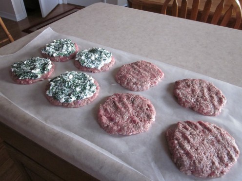 Top four of the patties with Feta and Spinach mixture.