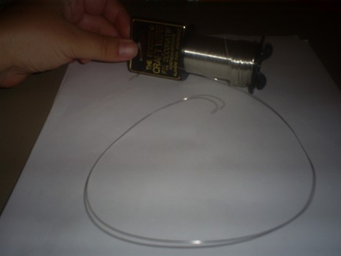 I cut off a piece of beading wire that was approximately fourteen to sixteen inches. 