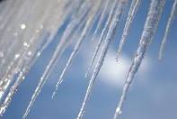 Beautiful icicles, but dangerous.  Stay away from hanging icicles.  You never know when one may fall!  Remember -- Safety First!