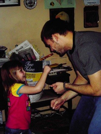 Here are my brother and niece play fighting at Christmas 4 years ago. Scott is one of the few good fathers I know.