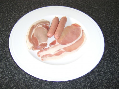 A pork loin fillet, 2 beef link sausages and two rashers of bacon form the meat components of this mixed grill