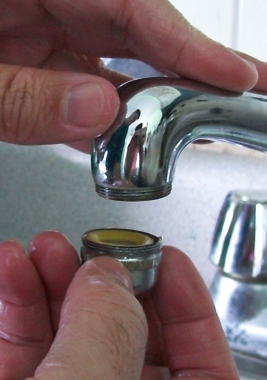 #1) The threaded end attaches to your faucet.