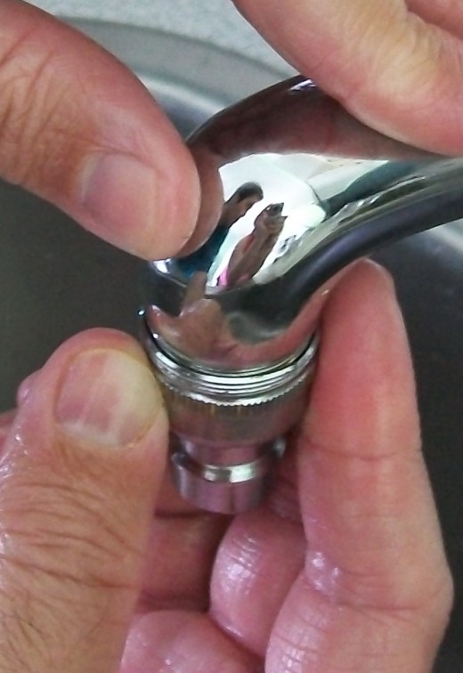 #2) Thread the adaptor onto the faucet.