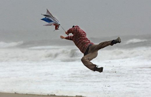 Winds knock a walker of his feet