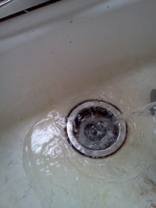 Step 5: Pour hot water down the drain to remove the Drano