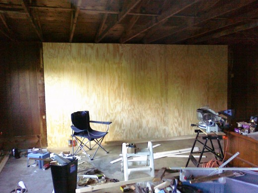 Before-Closet wall -built to close off the original garge door opening