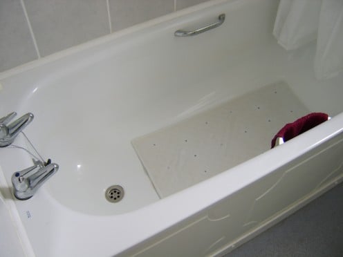 Filling the bathtub with water allows for manual toilet flushing and limited washing facilities
