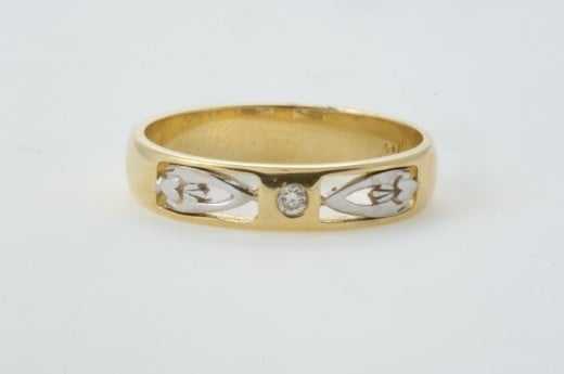Modern twist on a Claddagh Wedding Ring design