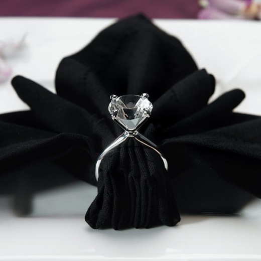 Silver plated diamond napkin holders show the reverence and care with which a napkin should be treated.