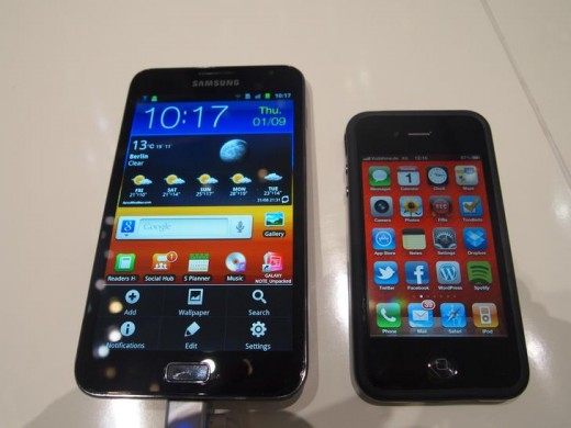 Samsung Galaxy Note, placed next to an iPhone. Look at the size of that thing!