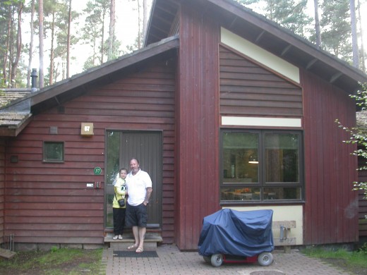 Chris and Lyndsey outside our woodland lodge.