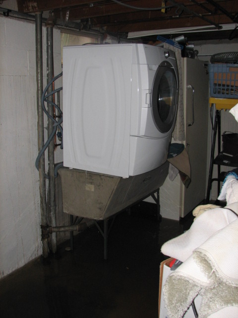 The new washer and dryer were raised off the ground as high as we could get them.