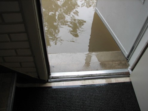 Water rises to reach the doors ledge.