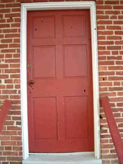 The door to Jennie Wade House, notice the bullet hole.