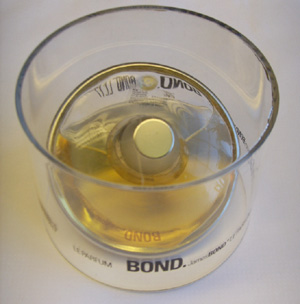 THIS IS NOT AN ALCOHOLIC DRINK, BUT A CONTAINER OF BOLD COLOGNE MADE FROM THE LEGENDARY JAMES BOND MOVIES. HOW DID ANYONE GET CLOSE ENOUGH TO BOND TO SMELL HIM?