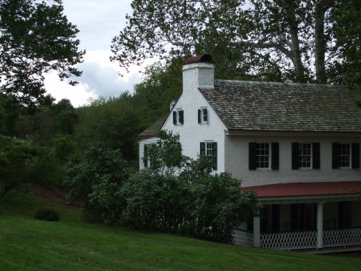 A view of the iron master's house at dusk.