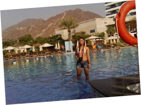 Enjoy the beach and the pool at Le Meridien Al Aqah Fujairah, bordering mountains on view