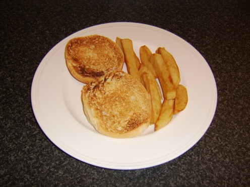 The toasted bap and the chips are plated