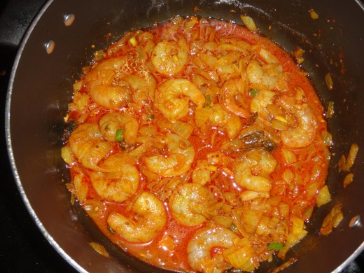 prawn mixed together with the spices and onion with water