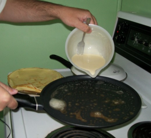 Pour the batter into hot pan