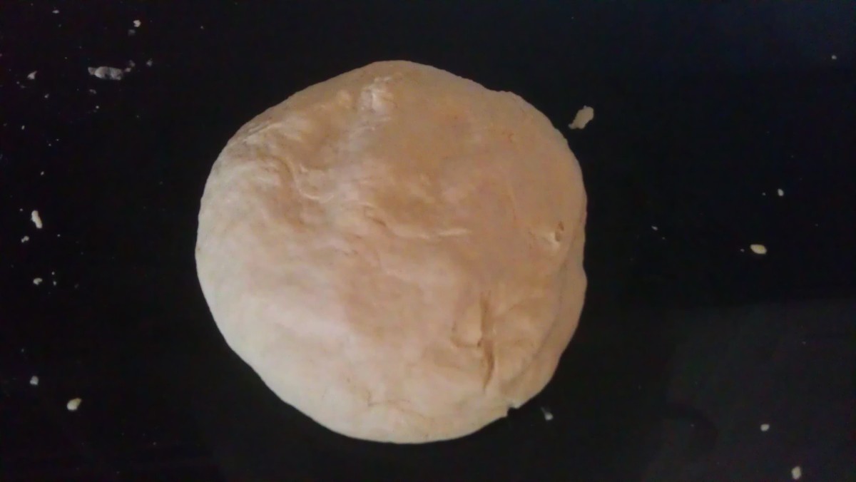 Knead well, including several slams onto your countertop. Yields a soft, tender ball of dough.