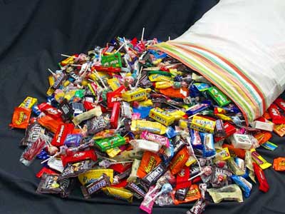 pillowcases full of candy for cool down in the Halloween Workout