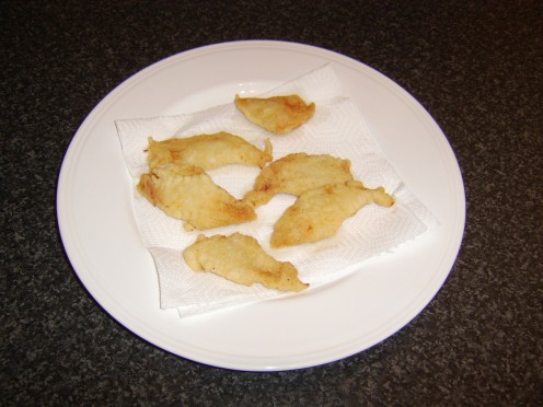 The whiting goujons are drained on kitchen paper before being served