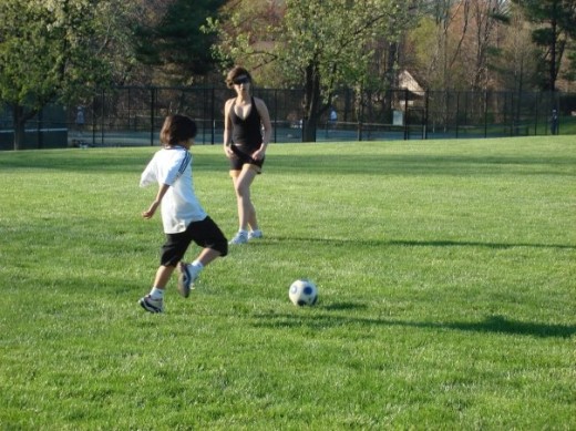 Playing soccer in the park