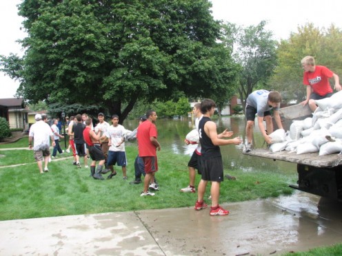The effort to sandbag streets were not initiated until after the river had crested the night before. 
