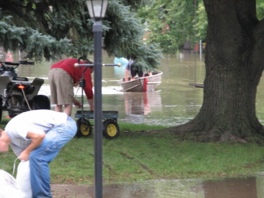 My ugly little boat was enlisted to carry sandbags when the Town Trucks could not get in where they were needed most.
