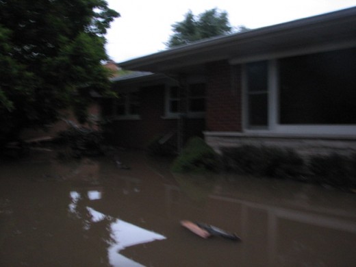 The water continued to rise through the day. We were praying it would not reach the upper level of our house.