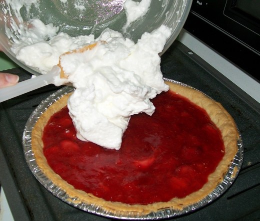 Add the meringue to the top of the pie