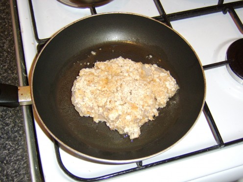 putting bag frozen meal into hot