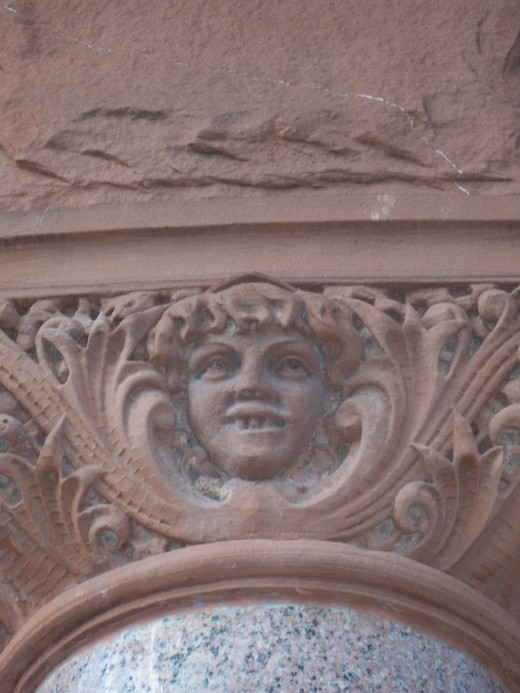 One of the many grotesque faces seen around the courthouse