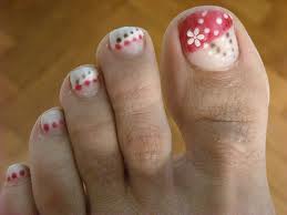 White flower and black red dots nail art design