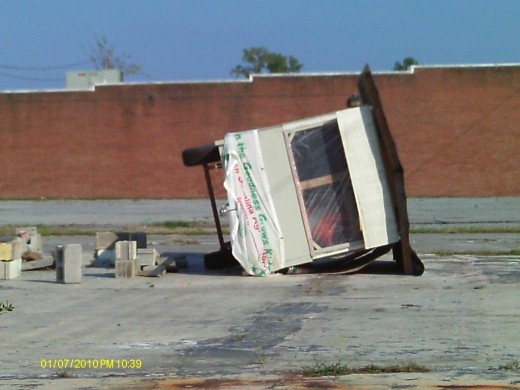 A local business shack was tipped over on its side.