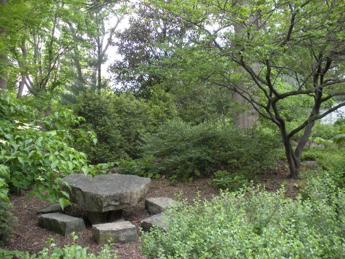 Photo 3 - I love how they used big rocks in this garden, to create a table with "seats."  Granted, they are cut some, but the idea is there to use rocks to make a picnic area.