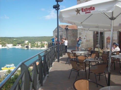 Our favourite cafe above the harbour with the Yellow Catamaran below