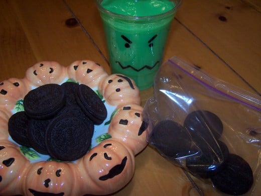Add some Oreo cookies to a plastic bag.