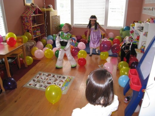 My daughter's 3rd birthday party featured balloons as the only activity. Kids played with the balloons and the toys around the house. It was easy and free-flowing fun!