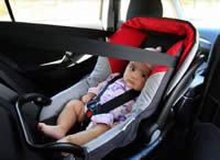 •Children younger than six months must be secured in a rearward facing restraint.